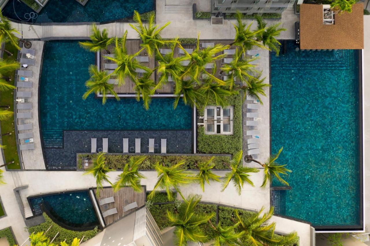 Oceanfront Beach Resort - Sha Extra Plus Patong Extérieur photo Aerial view of the pool at the hotel