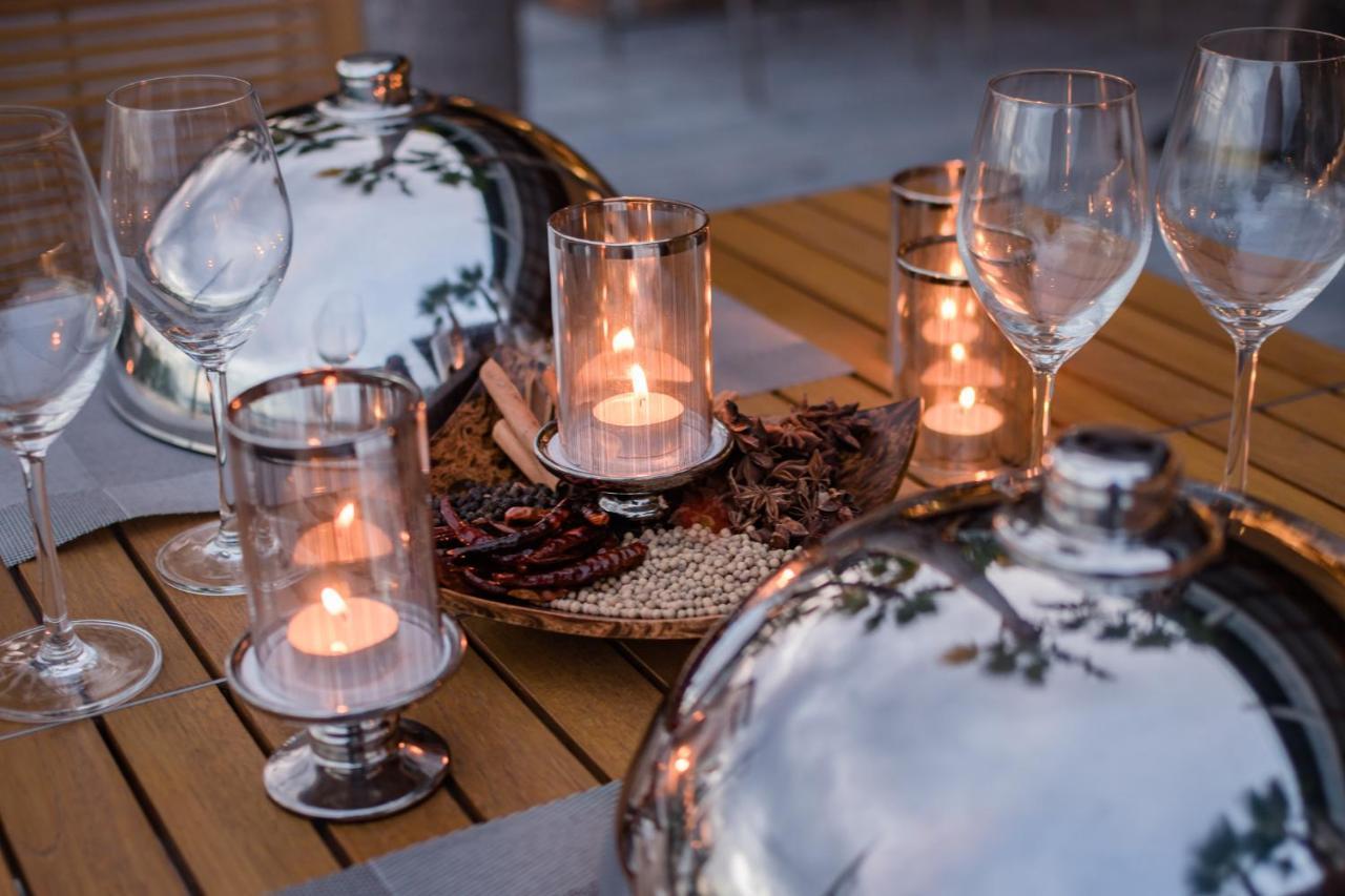 Oceanfront Beach Resort - Sha Extra Plus Patong Extérieur photo A table set for Shabbat