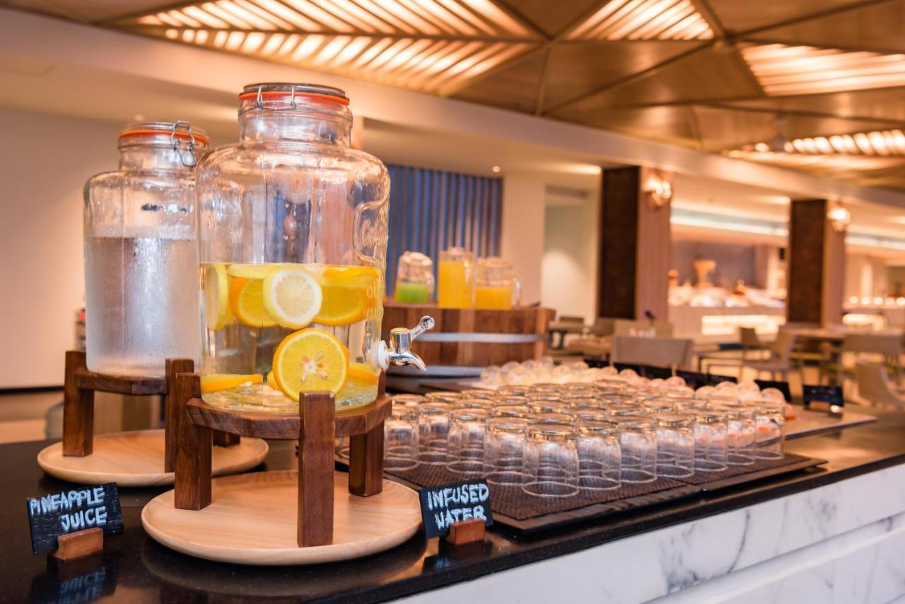 Oceanfront Beach Resort - Sha Extra Plus Patong Extérieur photo Infused water at a buffet