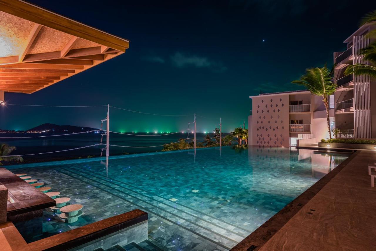 Oceanfront Beach Resort - Sha Extra Plus Patong Extérieur photo Infinity pool at the resort