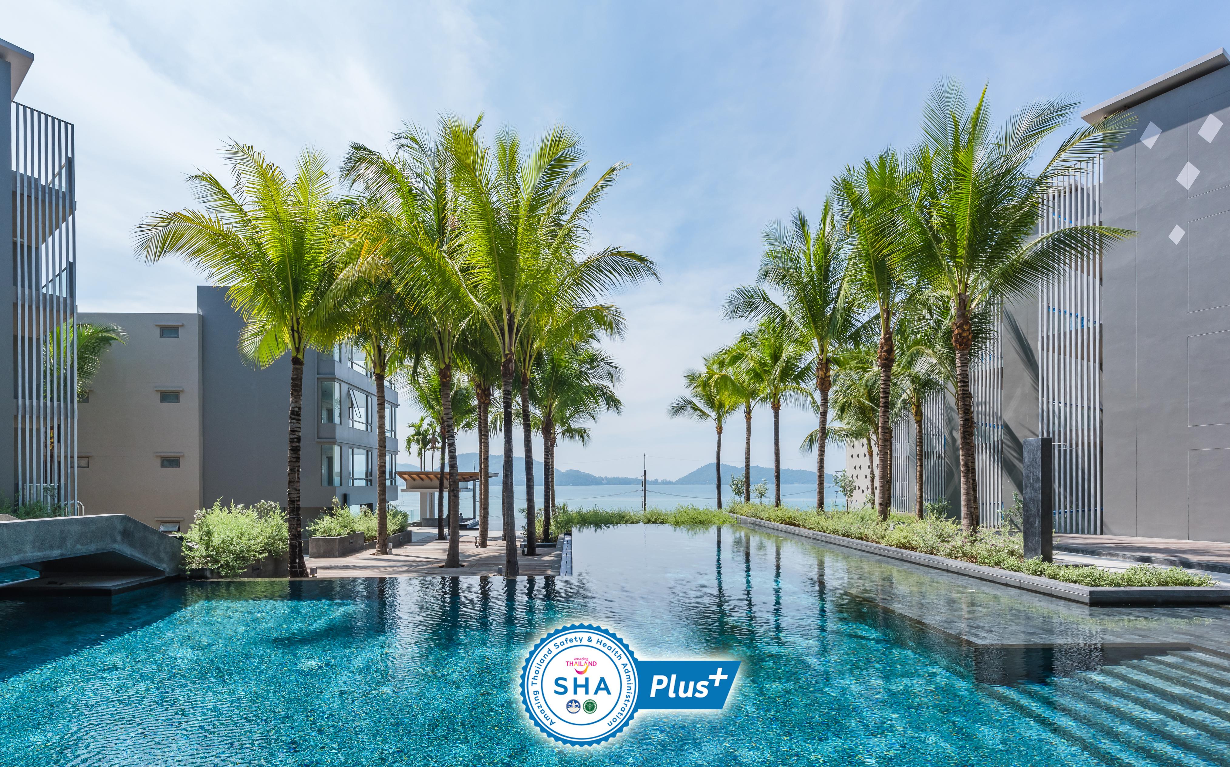 Oceanfront Beach Resort - Sha Extra Plus Patong Extérieur photo The SHA Plus logo