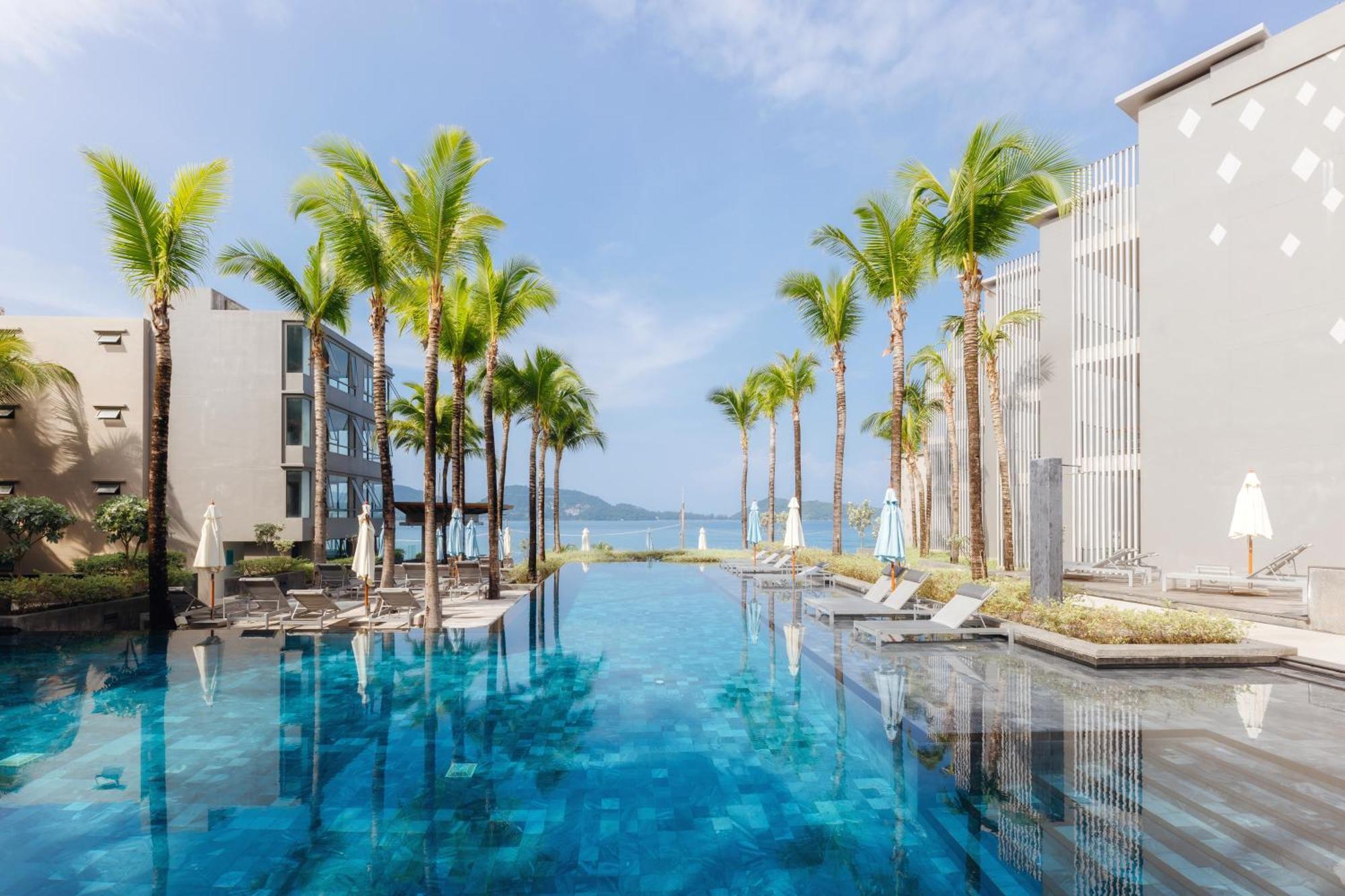 Oceanfront Beach Resort - Sha Extra Plus Patong Extérieur photo The swimming pool at the hotel